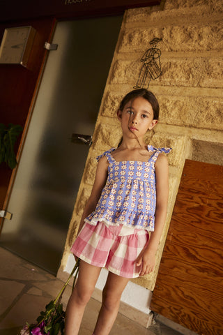 Lucie Pomponette Blue Blouse
